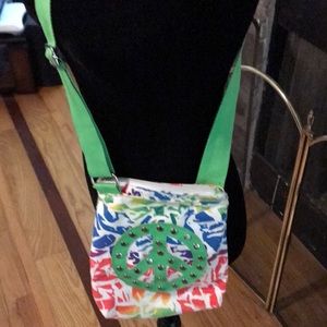 Cross body adjustable Peace purse